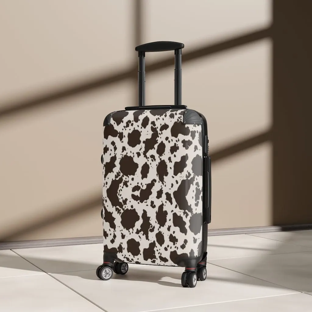 Brown and White Cow Luggage Set