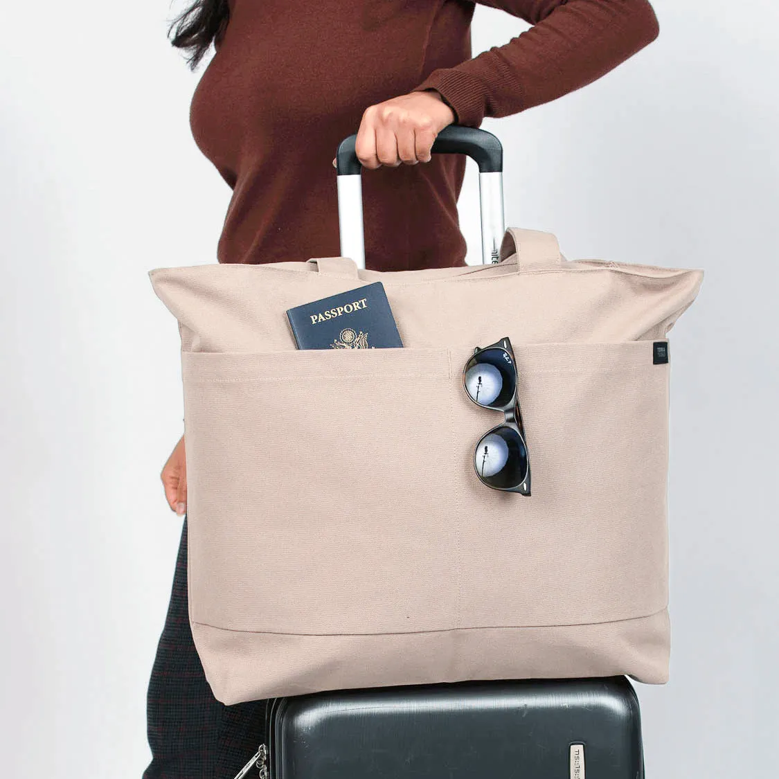 Tote bags with trolley sleeve